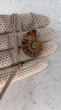 handmade fossiler ammonit schmuck anhänger aus madagaskar naturbelassen mit schmuckkordel fossiler schmuck stein anhänger ammonit naturstein schmuck von wonderworks 100 millionen jahre alt